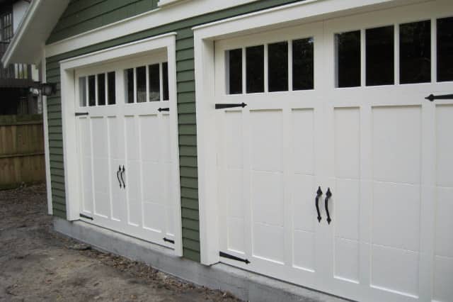 Carriage-style garage doors.